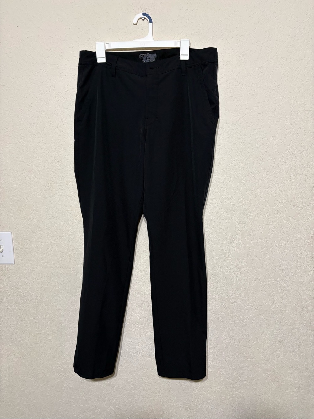 Huk Black Men's Jogger-Style outdoor activity pants. Fishing hiking